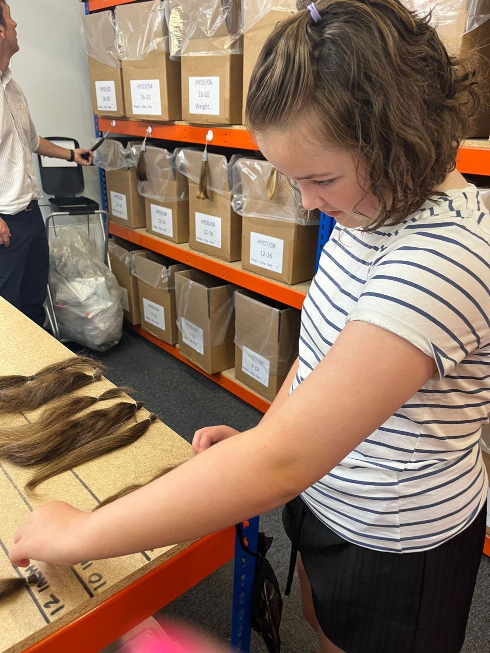 Girl looking at hair