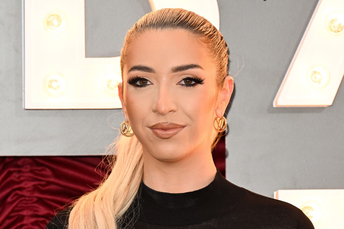 GK Barry wearing a black polo neck top at a film premiere