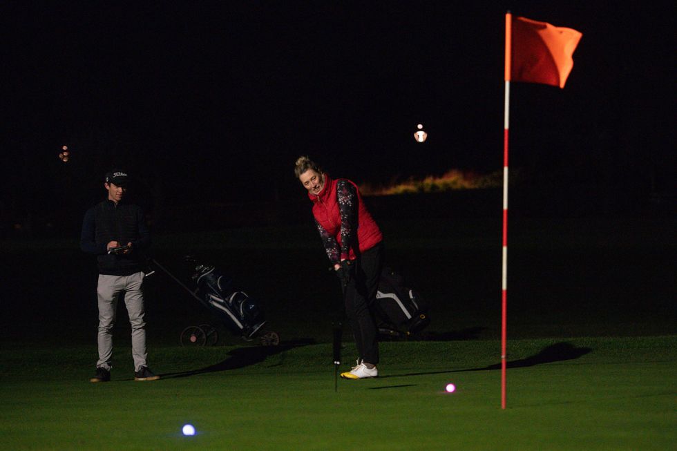 Golfers used neon coloured balls whilst under floodlights
