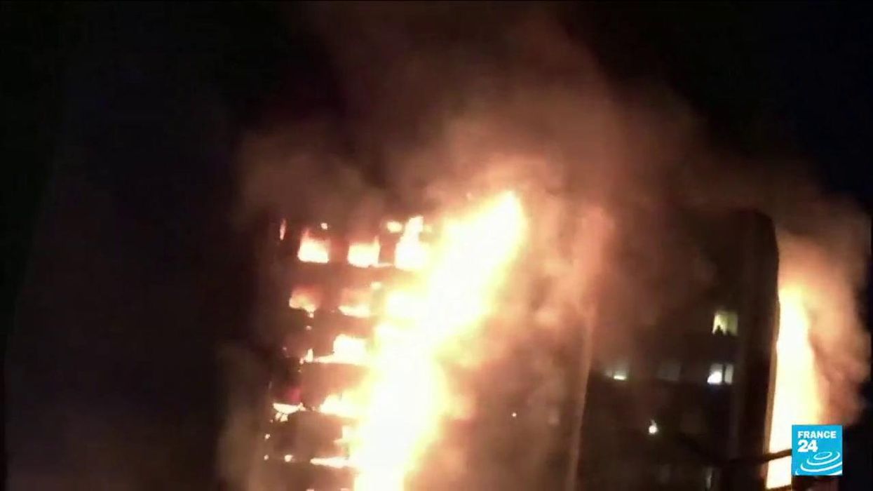 A firefighter used a Grenfell Tower photo on his Tinder profile