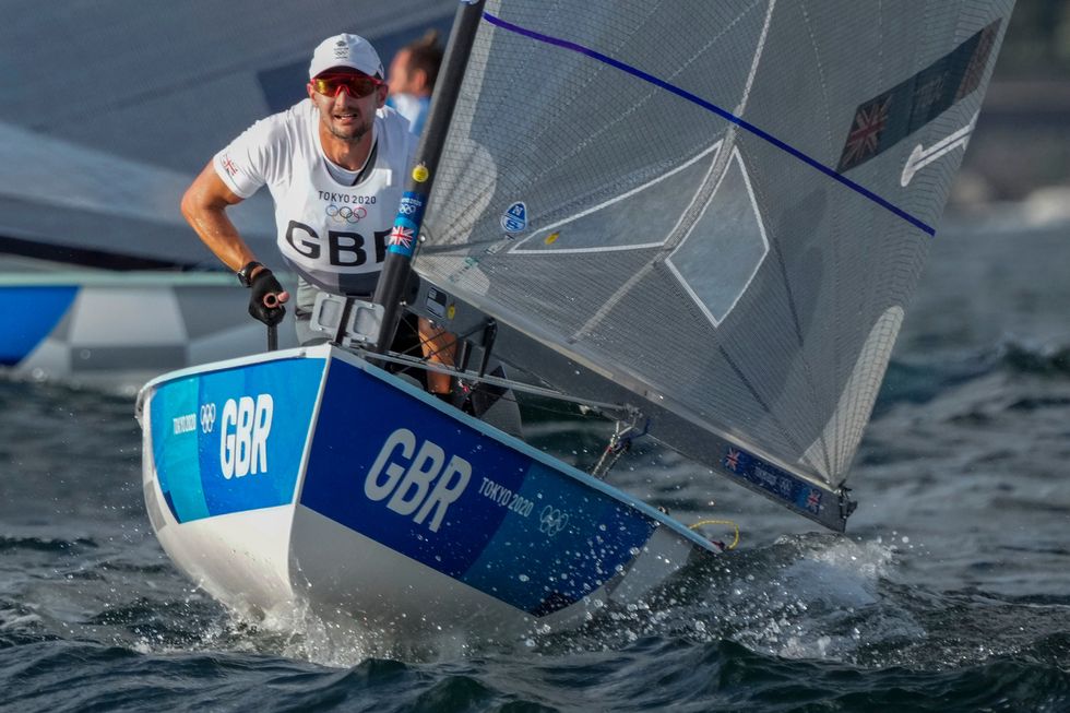 Great Britain\u2019s Giles Scott won gold in the men\u2019s Finn in a dramatic final day of the event in Tokyo (Bernat Armangue/AP)