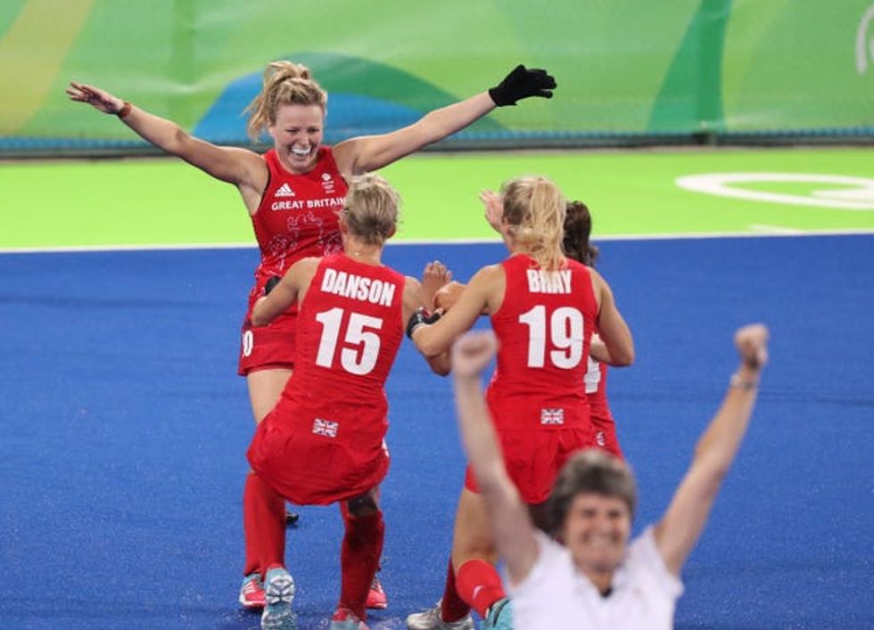 Great Britain\u2019s Hollie Webb celebrates with team-mates after scoring the winning goal in the penalty shootout during the Gold medal match against Netherlands at Rio in 2016