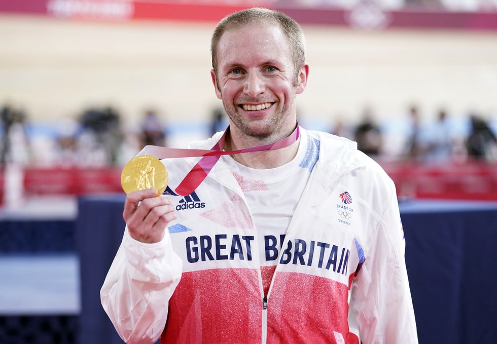 Great Britain\u2019s Jason Kenny celebrates with the gold medal in the Men\u2019s Keirin Finals (Danny Lawson/PA)