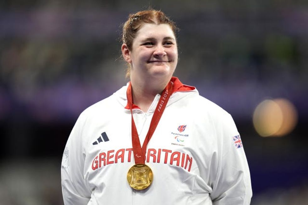 Great Britain\u2019s Sabrina Fortune wearing her gold medal