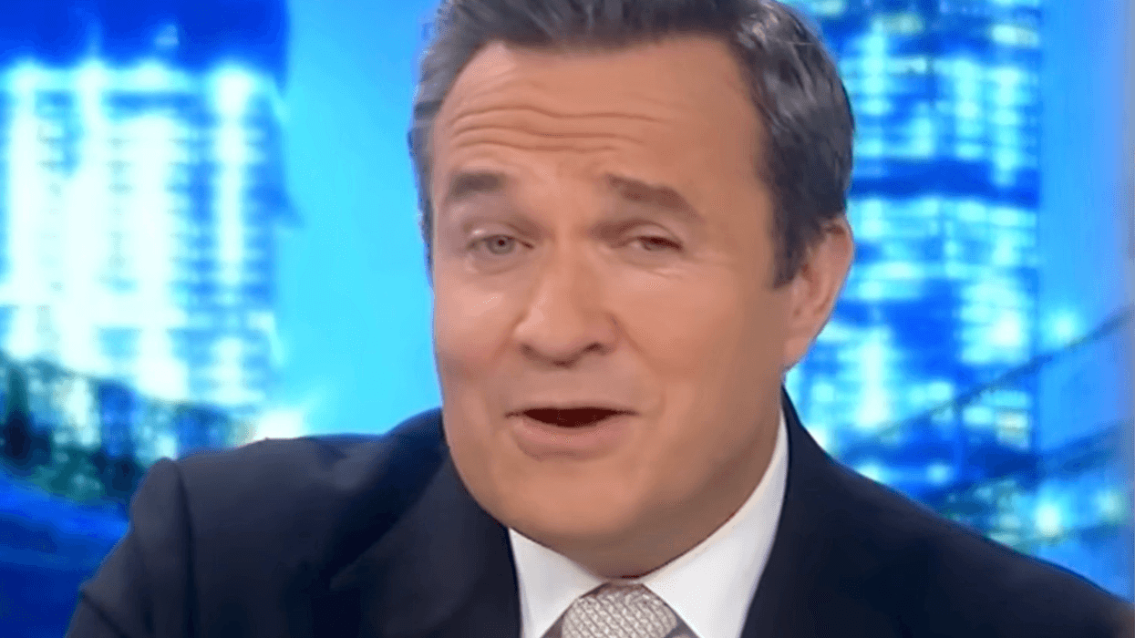 Greg Kelly presenting his Newsmax show.