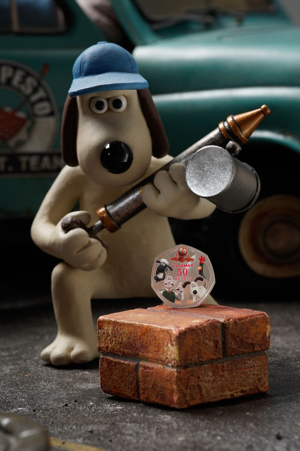 Gromit with a Royal Mint coin