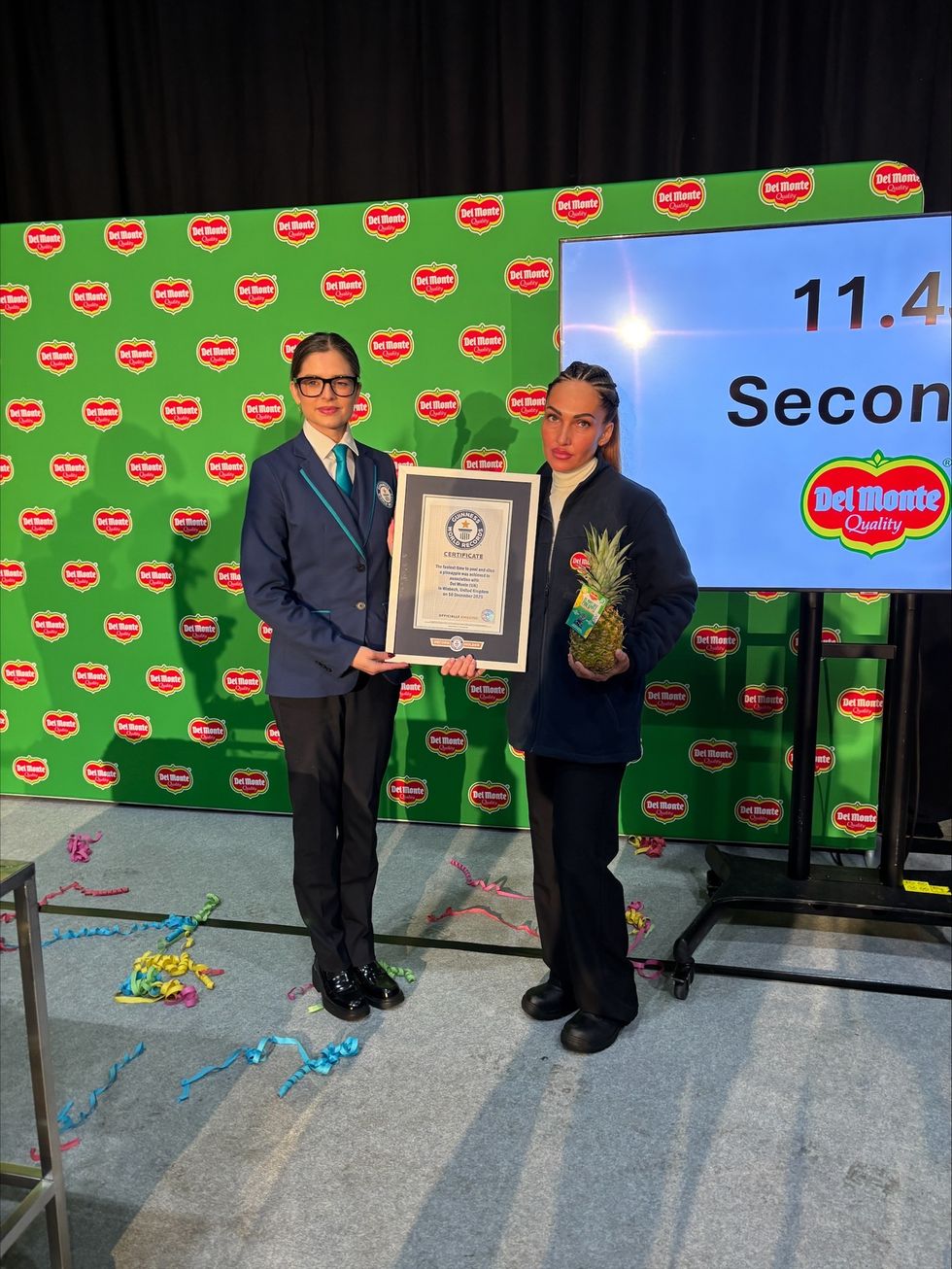 A cut above: Factory worker breaks world record to peel and slice a pineapple