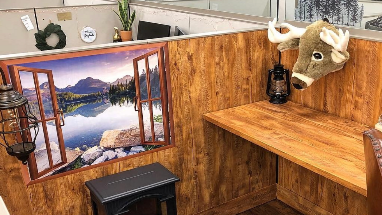Guy asks boss if he can decorate cubicle - gives it wood paneling and stove