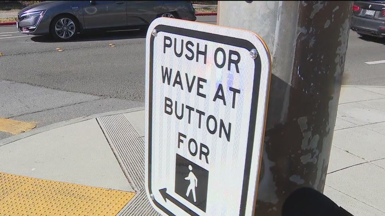 Passers-by 'disoriented' as Musk and Zuckerberg voice crosswalk buttons in AI prank