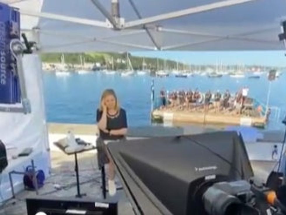 <p>Hala Gorani was hosting from Cornwall at the end of the G7 summit while the all-male choir sang metres away from her</p>