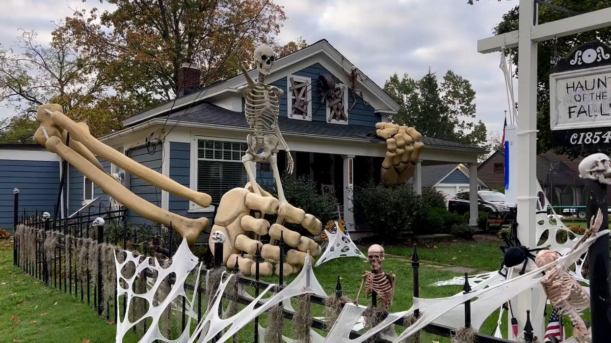 These 30ft skeleton arms are putting our Halloween decorations to shame