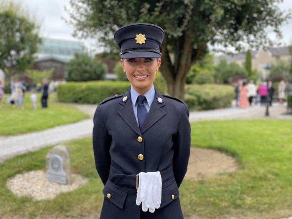 Hannah Egan, 19, from Co Laois, poses for a photo following a graduation ceremony in Templemore, Co Tipperary