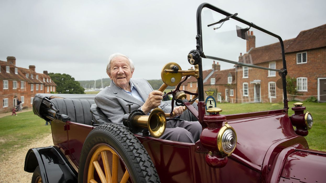 Harold Baggott goes for a drive in a Model T from 1915 at the Beaulieu Motor Museum (Matt Alexander/PA)