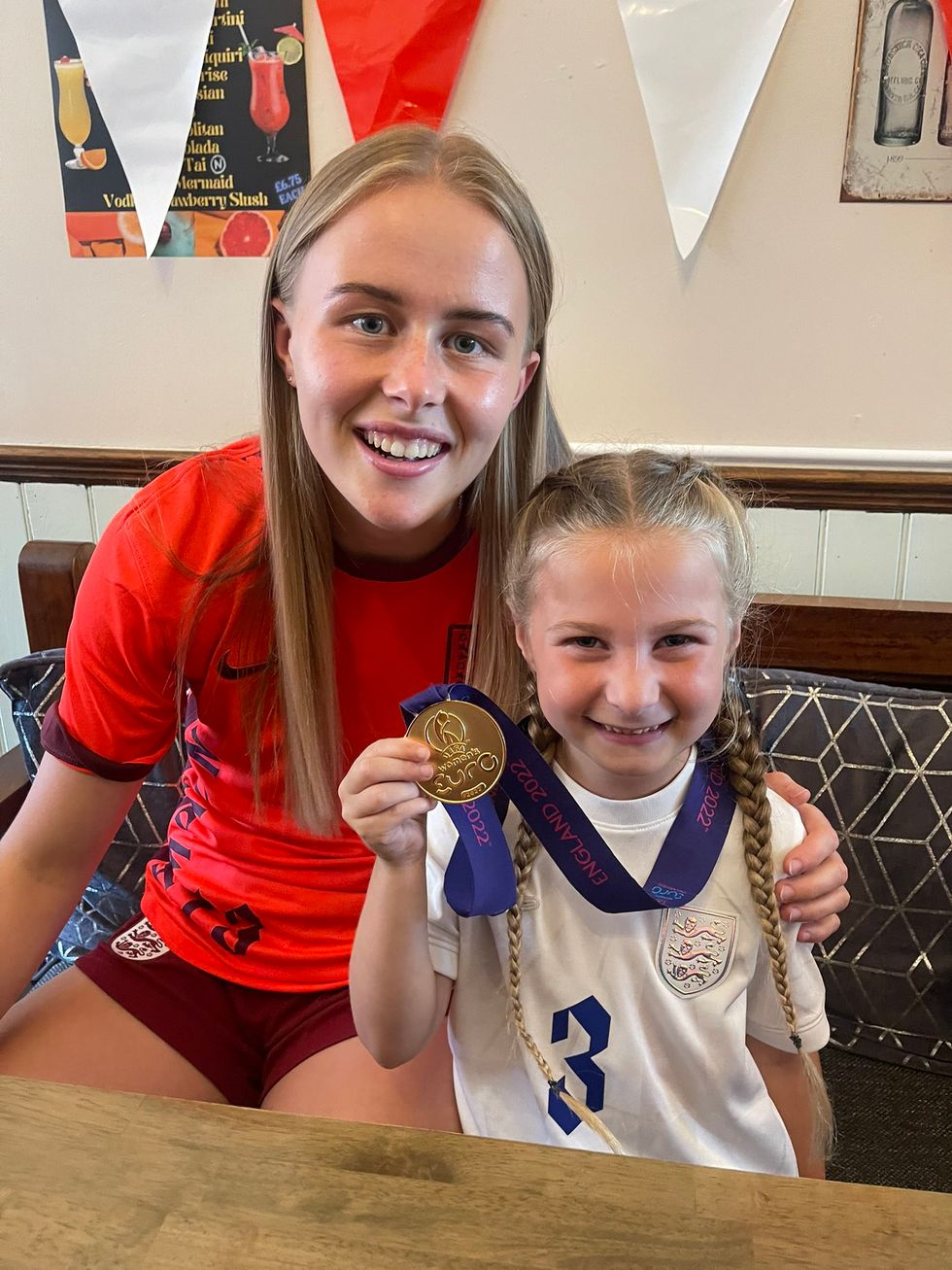Harper Mills, 6, met one of her hero's - Aston Villa women goalkeeper Hannah Hampton, who was on the substitutes\u2019 bench for the dramatic final match. (Lou Mills/PA)