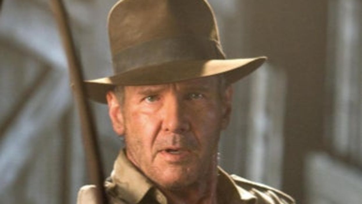 <p>Harrison Ford as Indiana Jones, wearing the fedora</p>