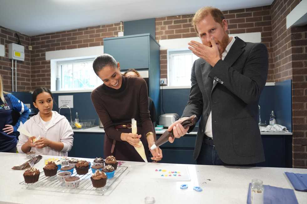 Royal icing proves beyond Harry’s talents as he and Meghan take on cupcakes task
