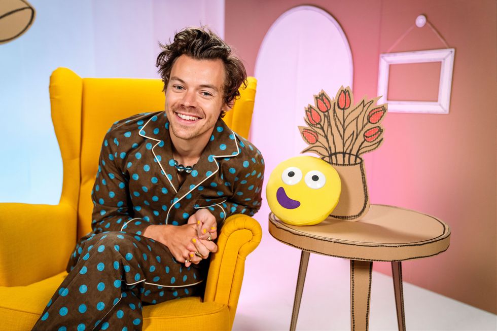 Harry Styles wears spotted pyjamas to read his CBeebies Bedtime Story