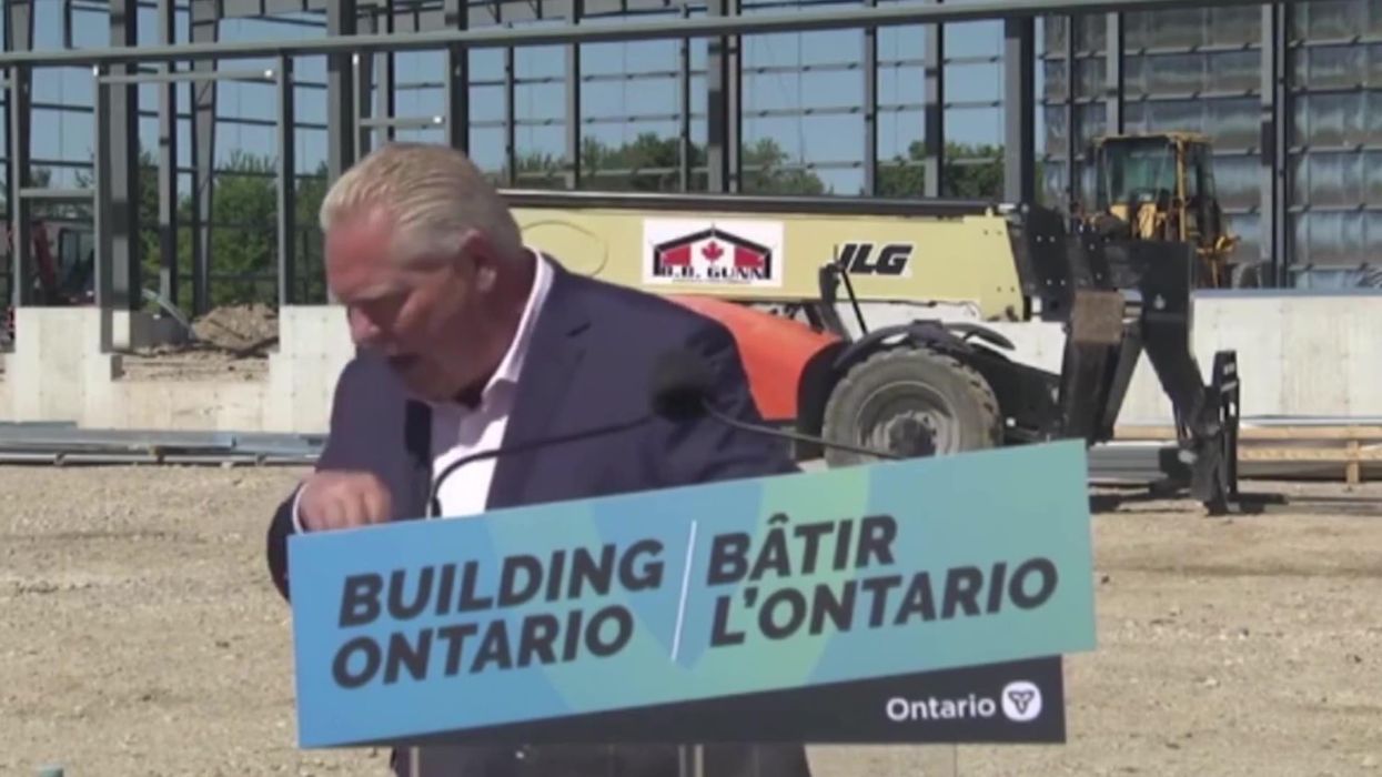 Shocking moment politician swallows a bee during live news conference