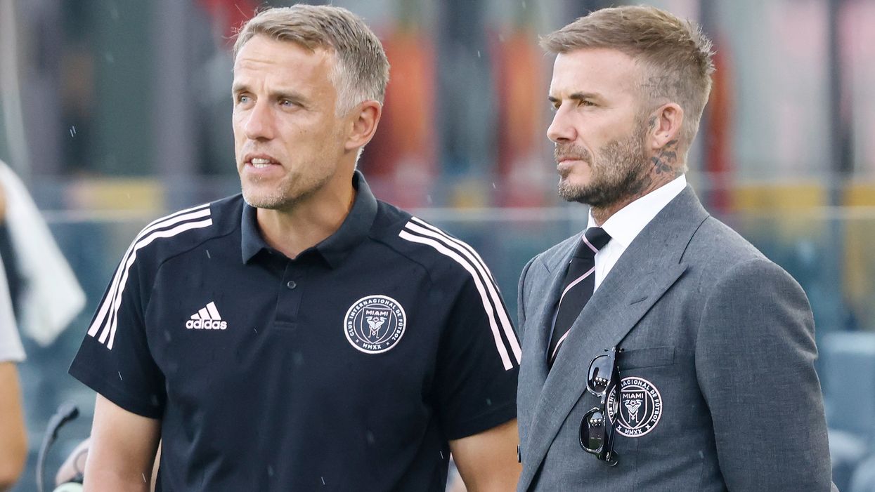 <p>Head coach Phil Neville, and owner David Beckham look on prior to the game against CF Montreal at DRV PNK Stadium on May 12, 2021 in Fort Lauderdale, Florida</p>