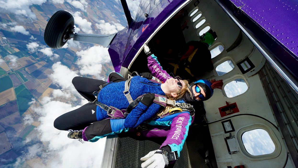 Headteacher Bridget Harrison resorted to a 15,000ft skydive to raise funds for school improvements, as there was was not enough cash in the school budget. (North London Skydiving Centre/ PA)