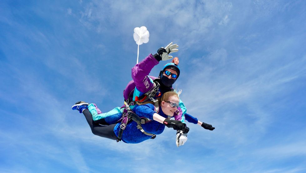 Headteacher Bridget Harrison resorted to a 15,000ft skydive to raise funds for school improvements, as there was was not enough cash in the school budget. (North London Skydiving Centre/ PA)
