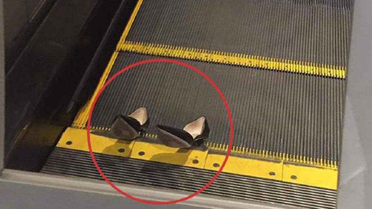 High heels stuck on an escalator