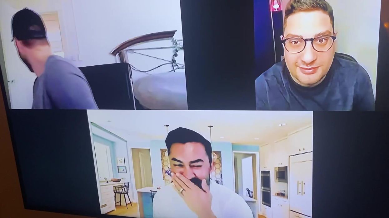 Hilarious moment naked man drops to the floor after walking in on his husband's Zoom call