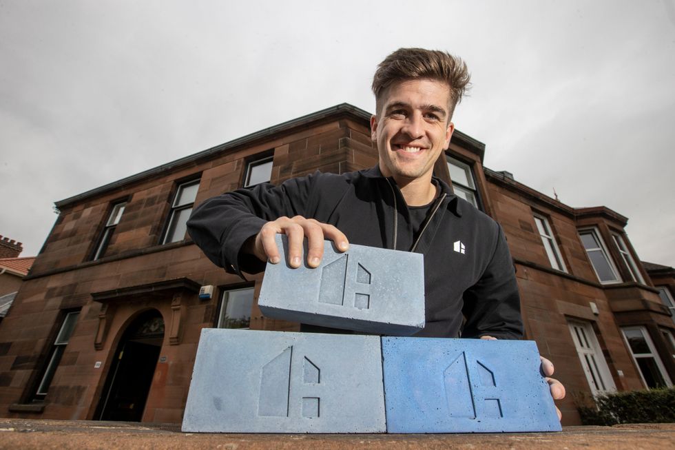 Hoko founder Danny Campbell with \u00a375,000 worth of the bricks (Jeff Holmes/PA)