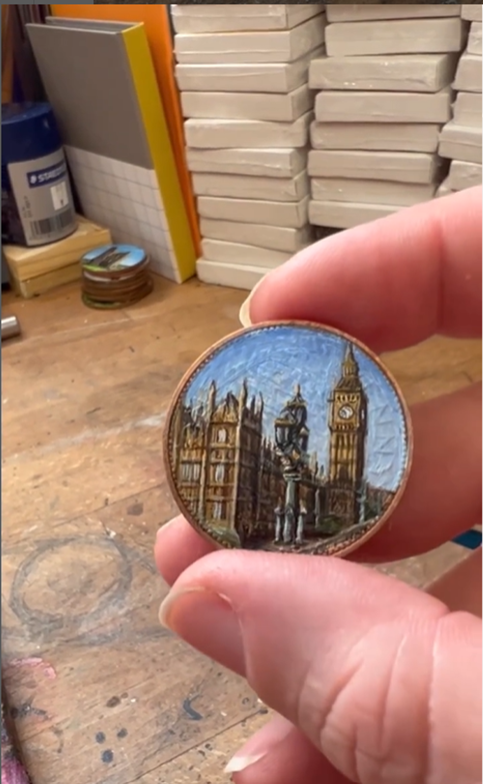 Houses of Parliament painted on coin