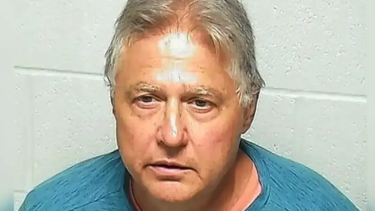 Man arrested for shooting himself during his sleep