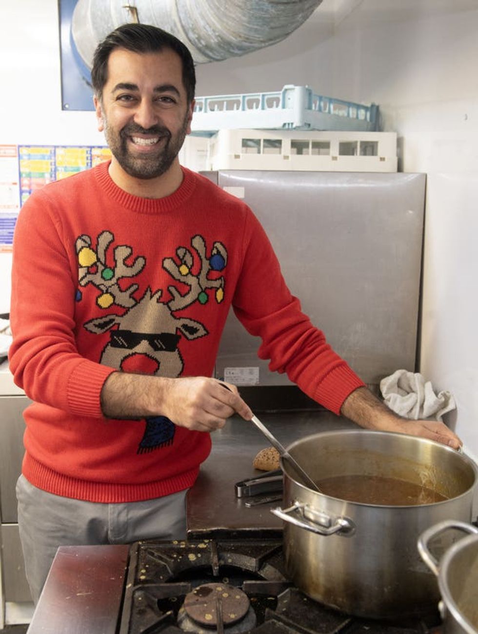 Humza Yousaf serving lunch