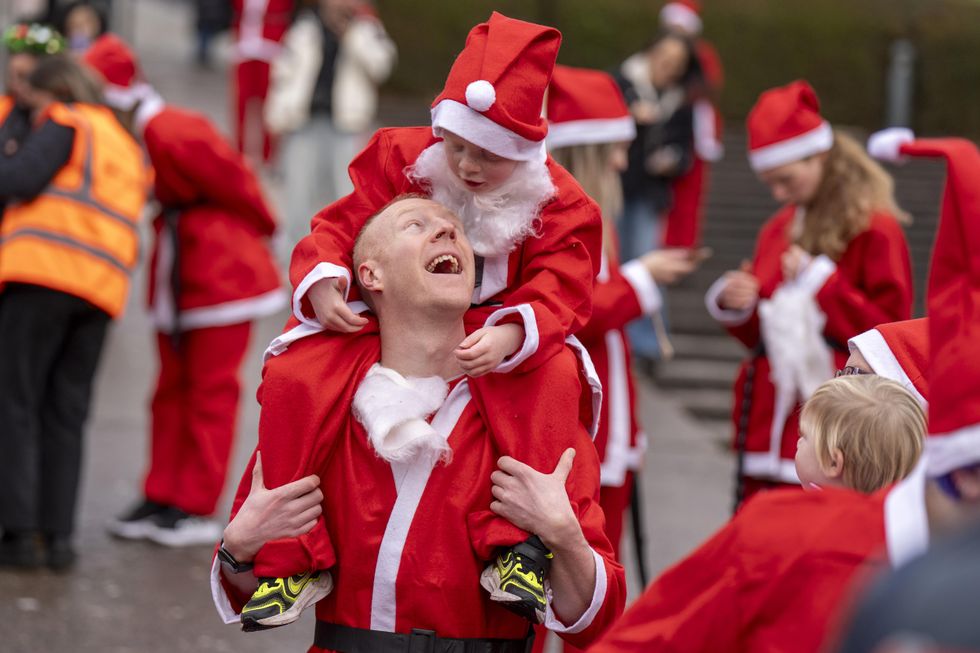 In Pictures: Dashing through the streets, charity Santas on the way