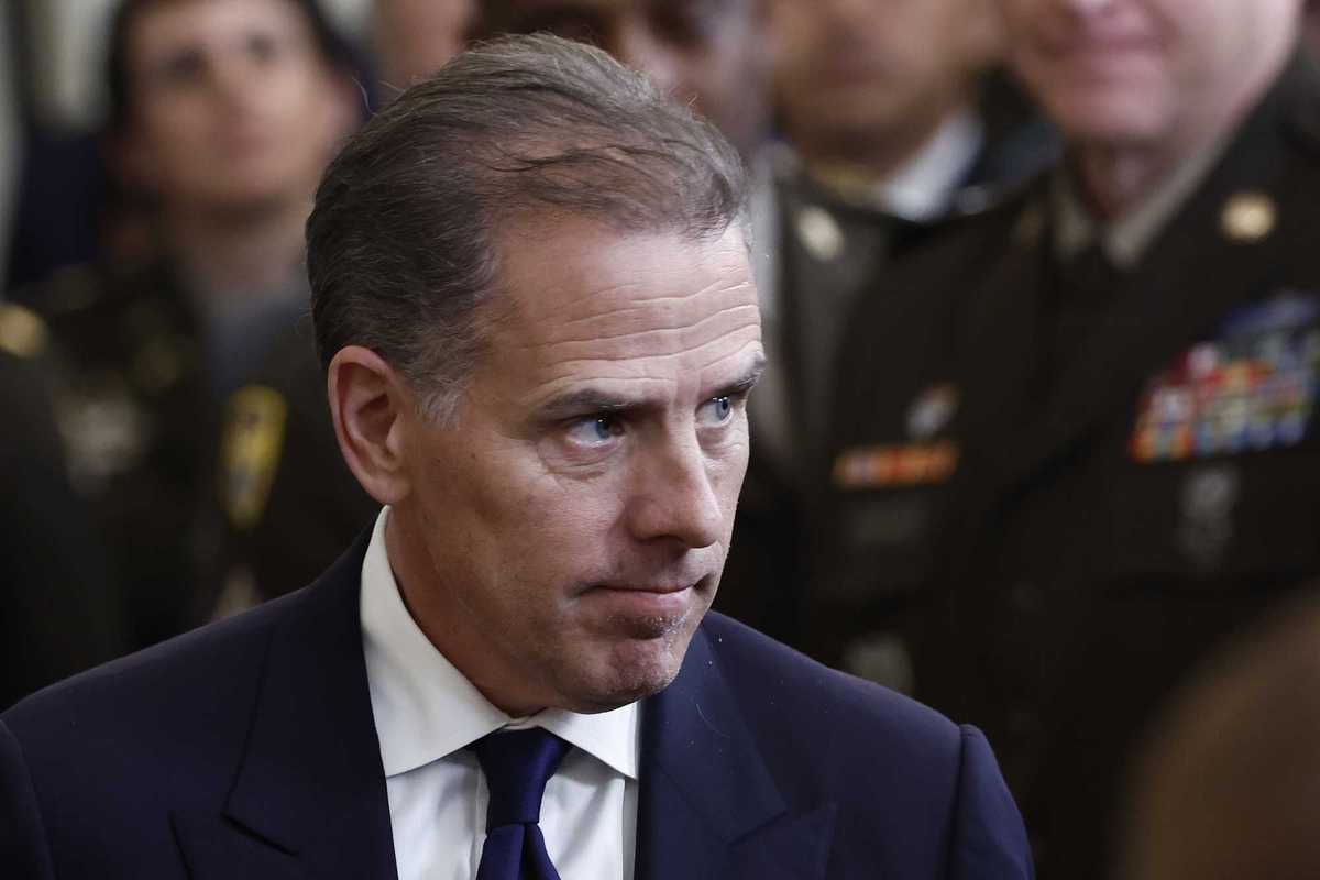 Hunter Biden, a white man with short black hair and a navy suit and tie.