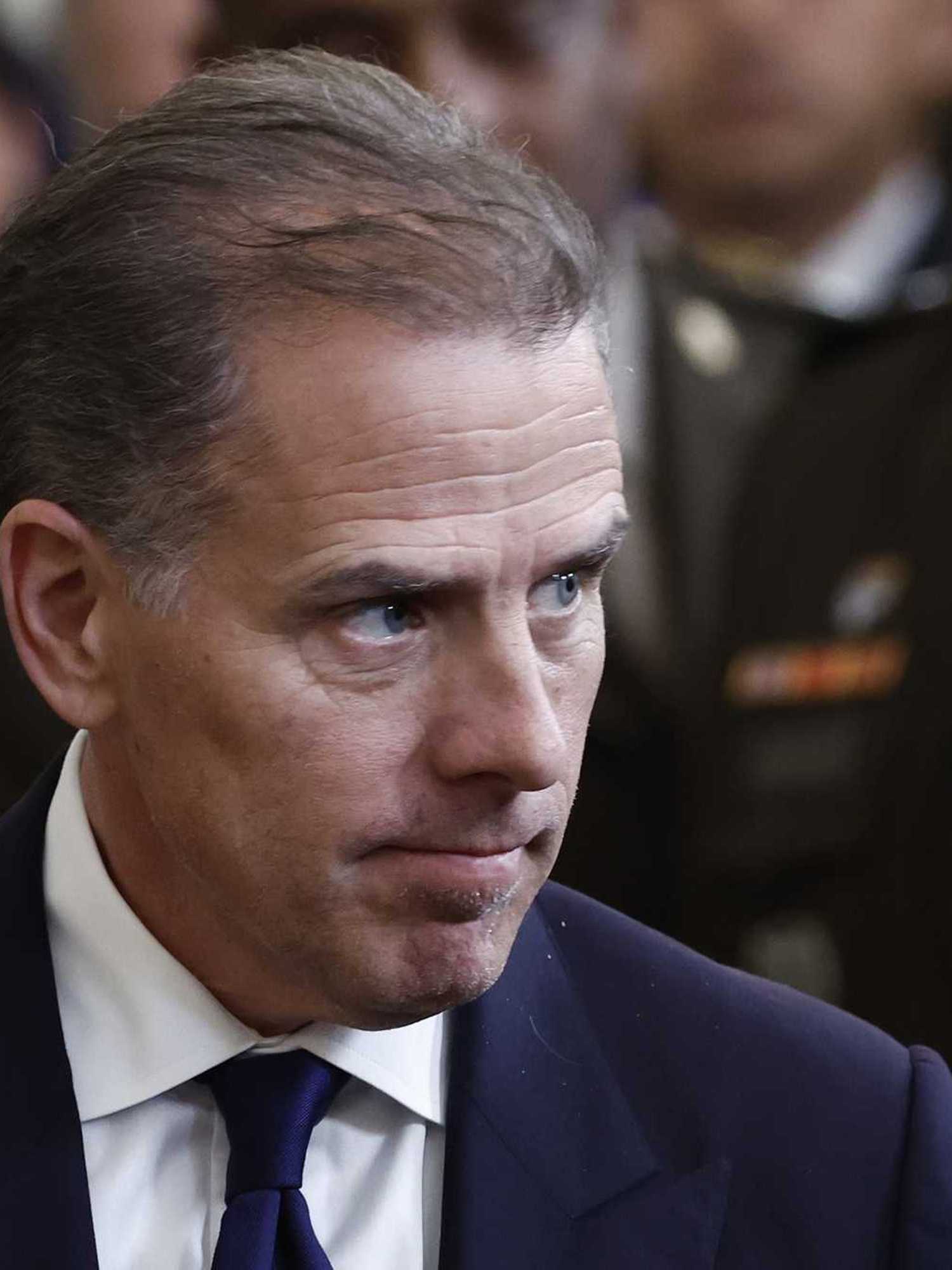 Hunter Biden, a white man with short black hair and a navy suit and tie.