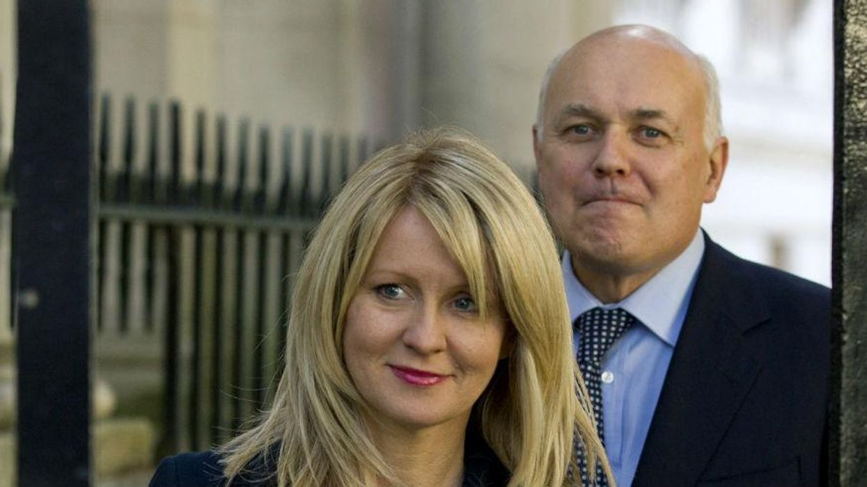 Iain Duncan Smith and employment minister Esther McVey arrive at Downing Street