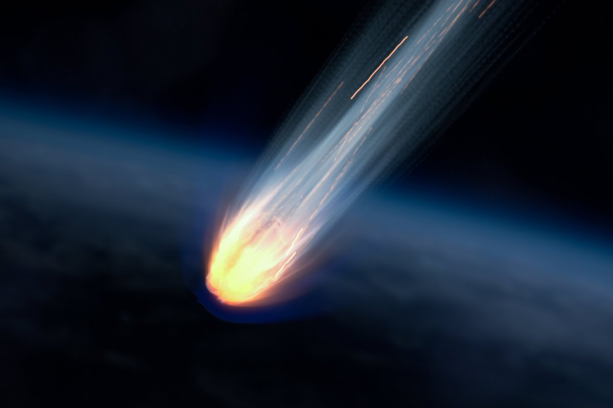 Illustration of an asteroid burning up in Earth's atmosphere.