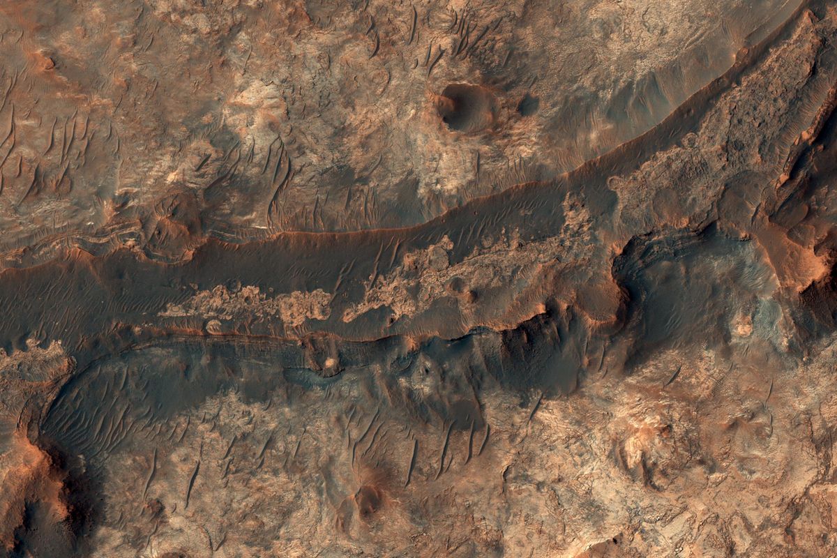 Image captured  by NASA's Mars Reconnaissance Orbiter showing a dark ridge snaking across the Mawrth Vallis on Mars