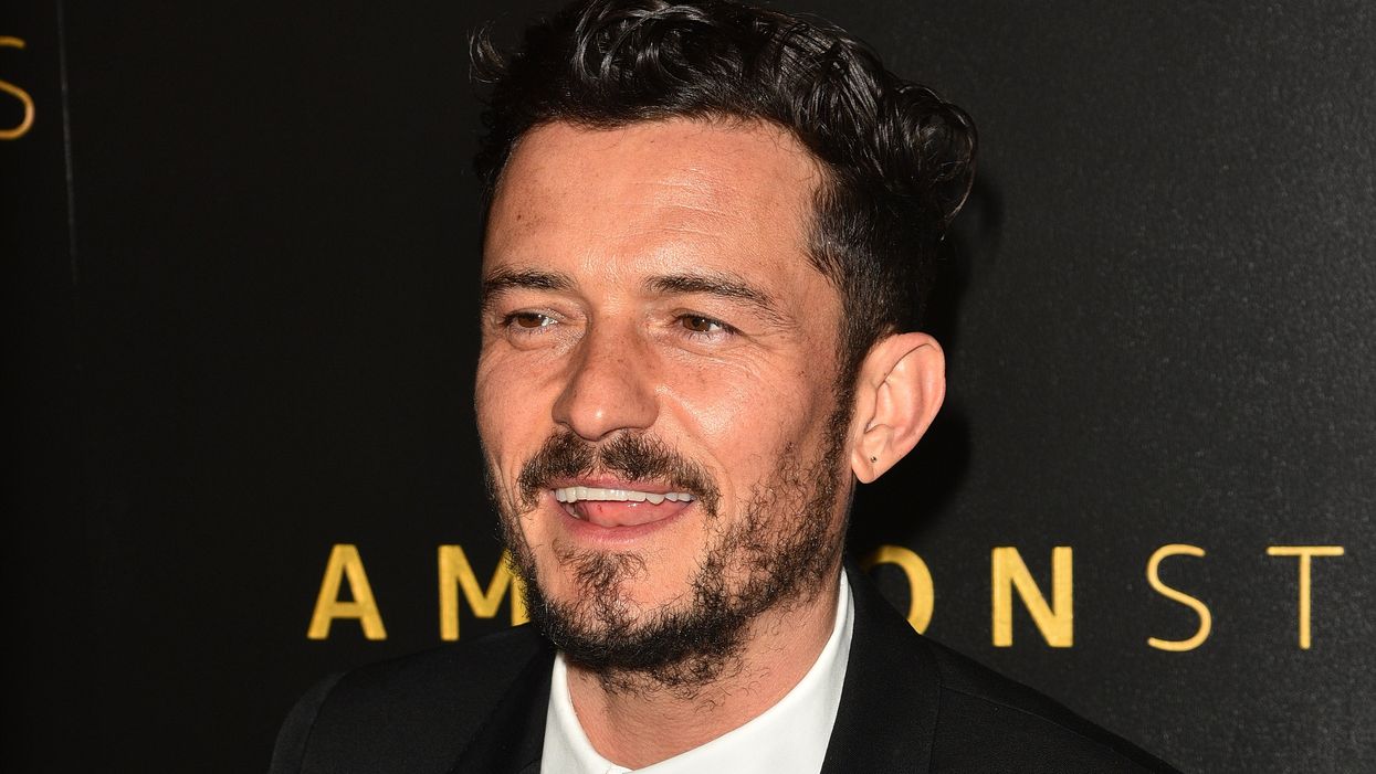 Orlando Bloom hits the water naked —again