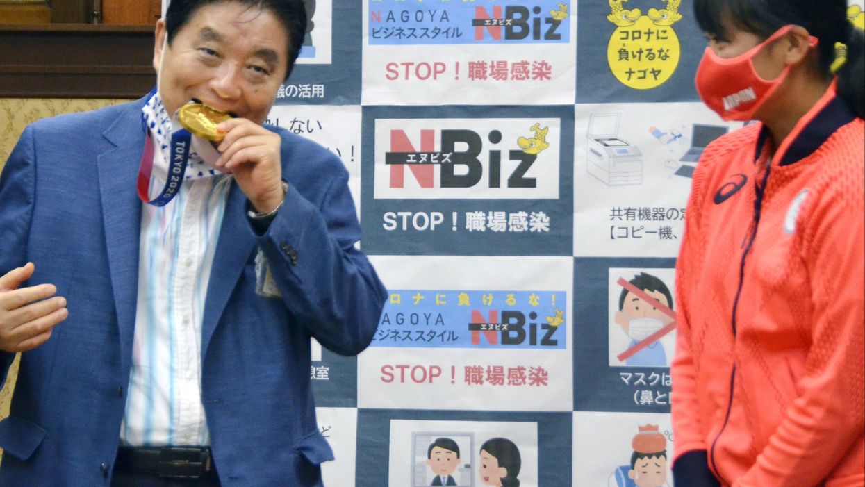 Japanese mayor offers to forfeit three months of pay after causing ‘disgrace’ by biting Olympian’s gold medal