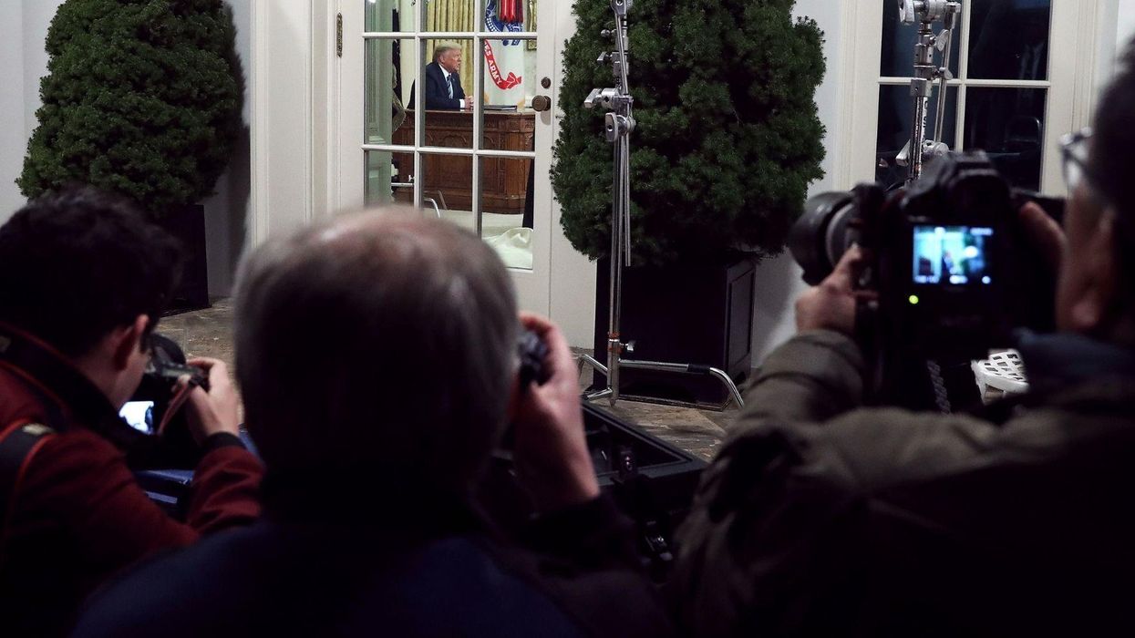 This one photo of Trump's press conference has gone viral for being absolutely perfect