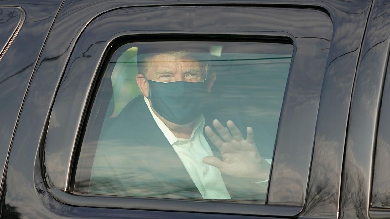 Trump supporter filmed screaming 'I will die for him!' during bizarre drive-by around hospital