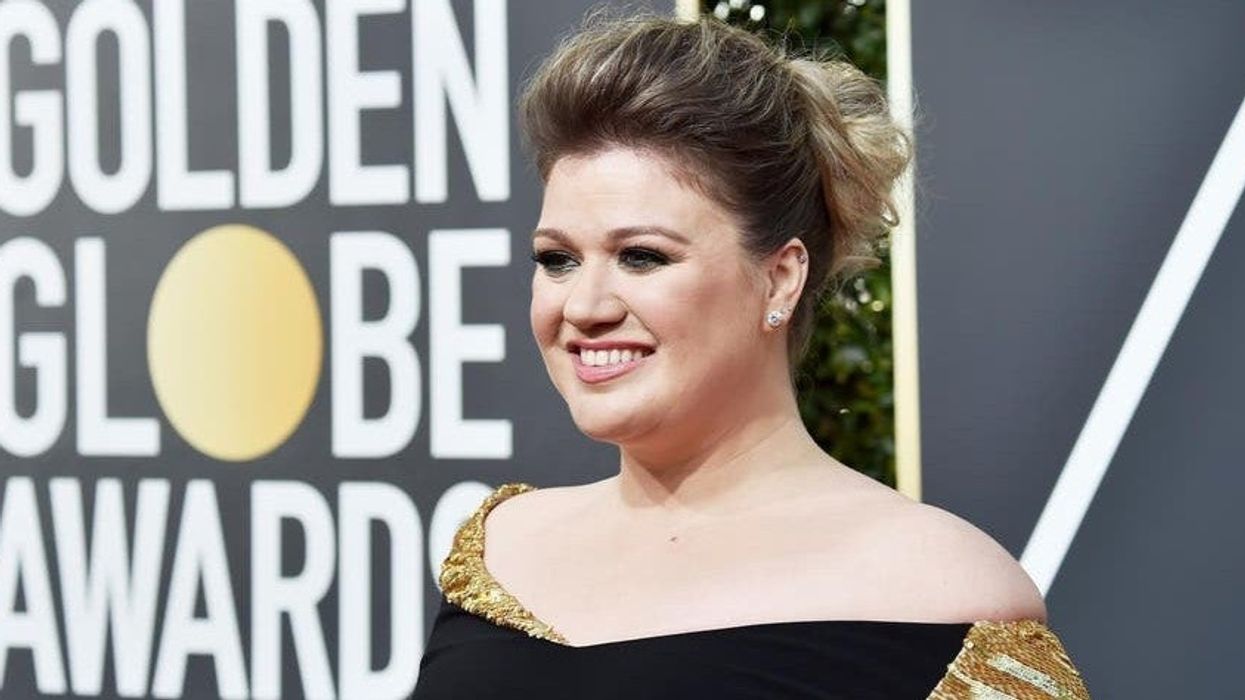 Kelly Clarkson shuts down fan who says her marriage ended because she works too much