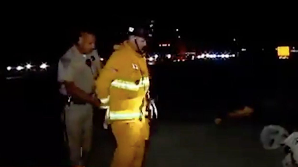 Firefighter arrested as he tried to save car crash victims in resurfaced clip