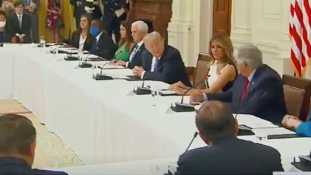 This video of Trump being showered with praise during a meeting is seriously disturbing