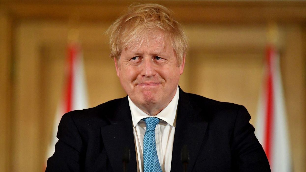 Boris Johnson ridiculed for posing doing a 'press-up' to prove he's 'fit as a butchers dog'
