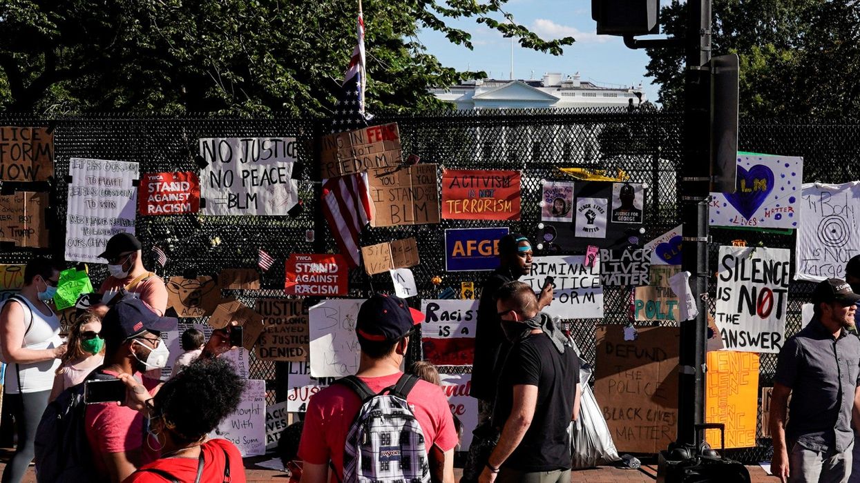 Black Lives Matter protestors have turned the fence protecting the White House into an anti-racism monument
