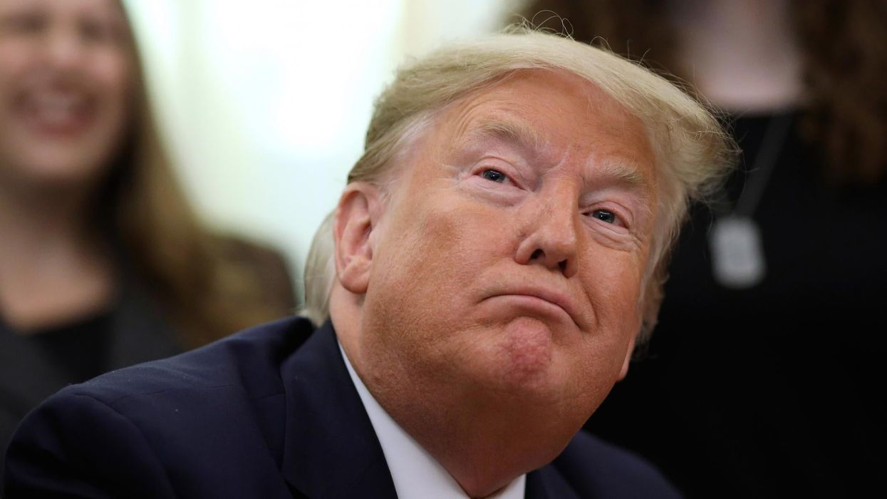 Trump says he's the 'hardest working president in history' as report says he's watching TV and eating fries all day