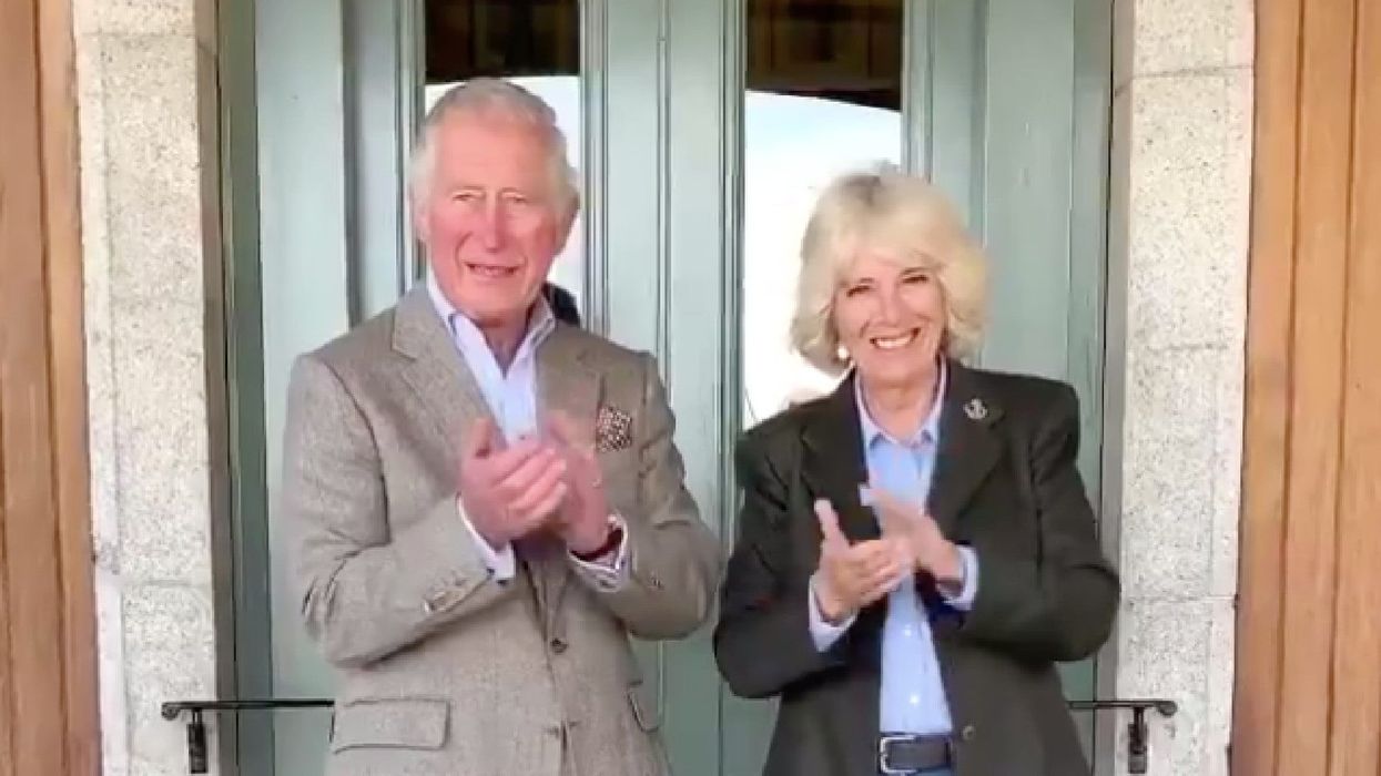 Prince Charles and Camilla clapping for carers might be the most awkward thing you'll see today