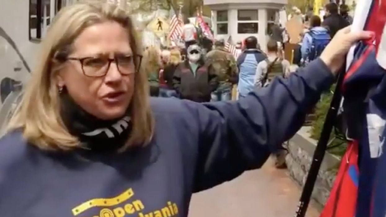 Anti-lockdown protester says she doesn't believe in science because she 'believes in god' instead