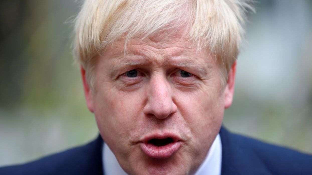 People are comparing Boris Johnson to Neville Chamberlain as report accuses him of shocking coronavirus failures